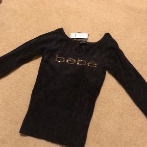 Brand new with tags, black Bebe sweater